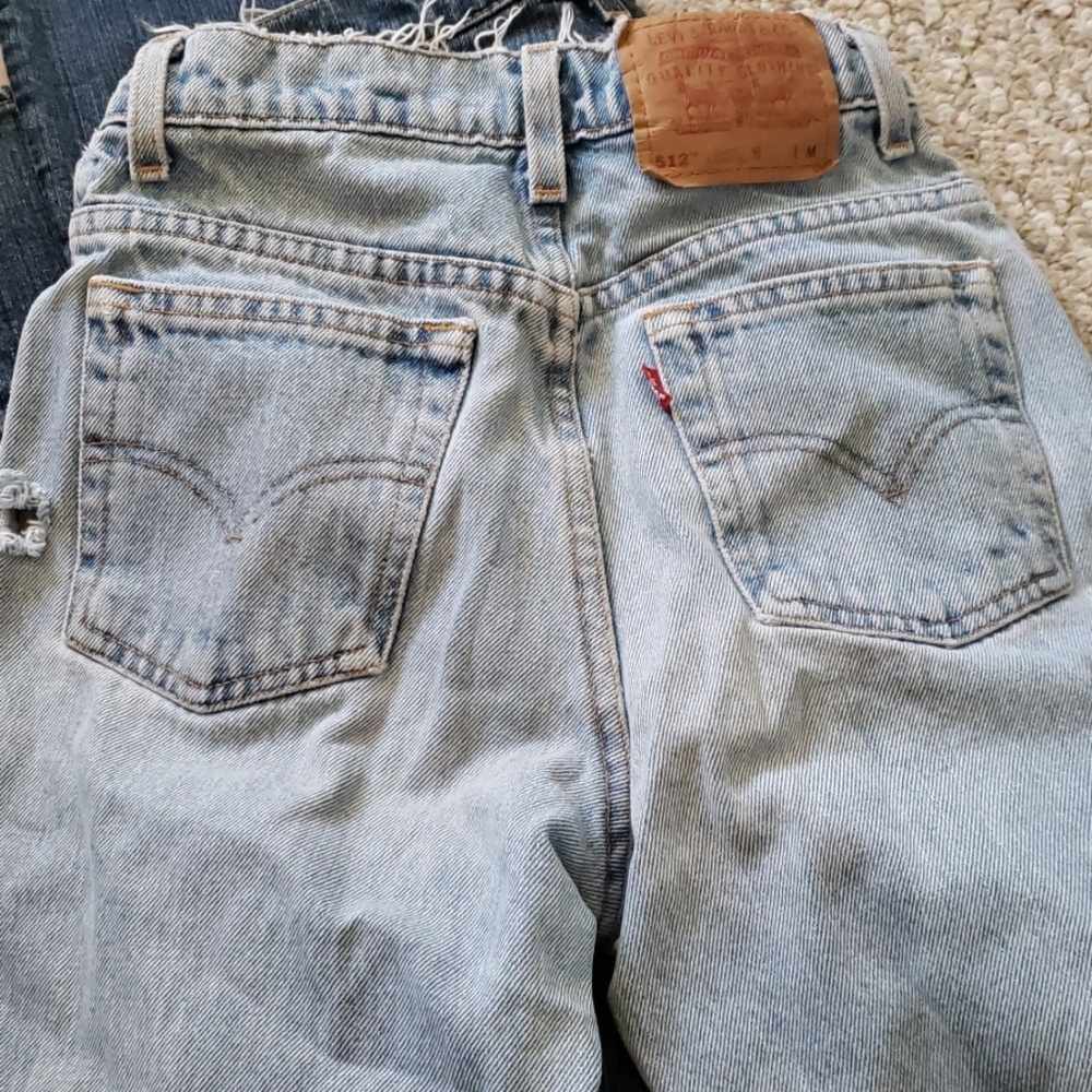 Levies 512 slim fit faded and worn blue jeans
